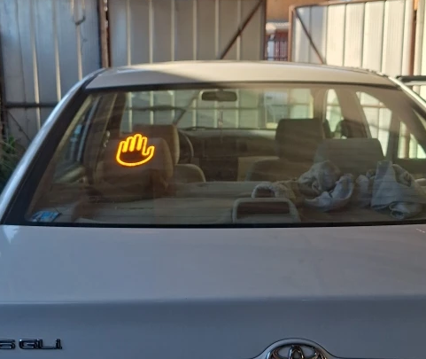 BackHand installed on rear windshield